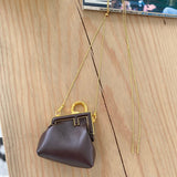 Ziva's Charm handbag – side angle view (11.5cm*10cm*5.5cm)