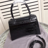 Styled lifestyle shot of chic premium women's handbag – women's luxury handbag