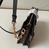 Handle and strap detail of sleek structured women's handbag – women's statement bag