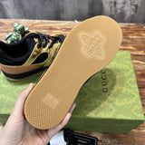 Side profile of Gucci muted earth tones sneakers everyday casual design