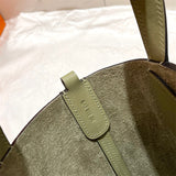 Close-up detail of poised bag design
