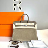 Side view of clean-lined structured handbag