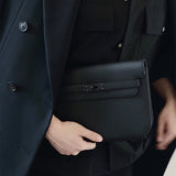  Sleek shoulder bag carried on shoulder