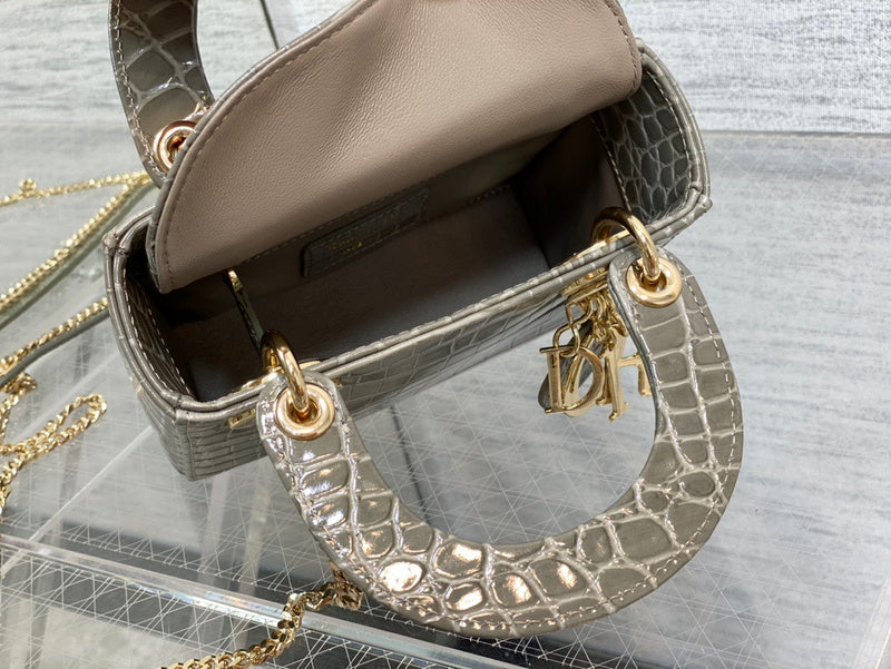 Styled lifestyle shot of statement sleek women's handbag – women's luxury handbag