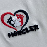 Front view of Moncler luxury clothing with contemporary cut