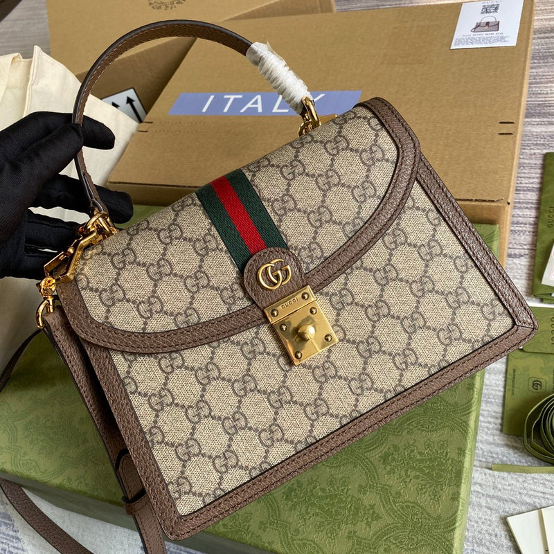 Styled lifestyle shot of everyday-luxe structured women's handbag – women's luxury accessory