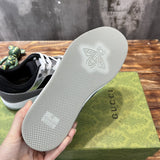 Side profile of Gucci tonal black sneakers padded collar comfort