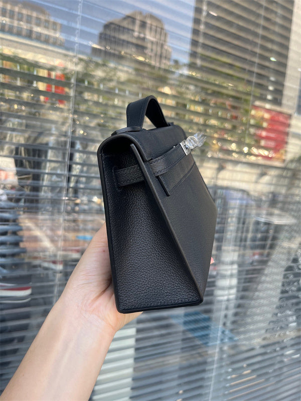 Side view of modernist structured handbag