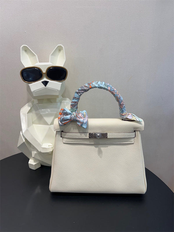  Effortless top-handle bag carried on shoulder 10