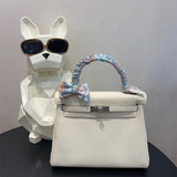  Effortless top-handle bag carried on shoulder 10