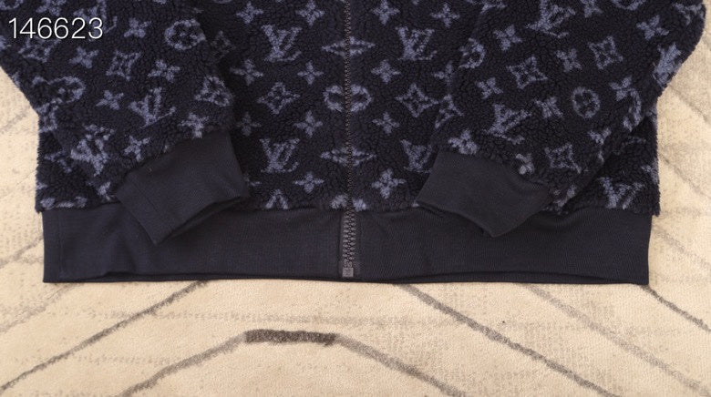 Full styled look of Louis Vuitton luxury clothing with tailored silhouette