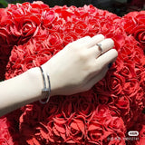 Front view of Cartier unisex jewelry piece