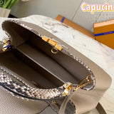 Side profile of sleek elevated women's handbag – women's luxury accessory