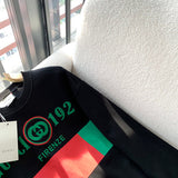 Back view of Gucci luxury clothing with monogram-inspired silhouette