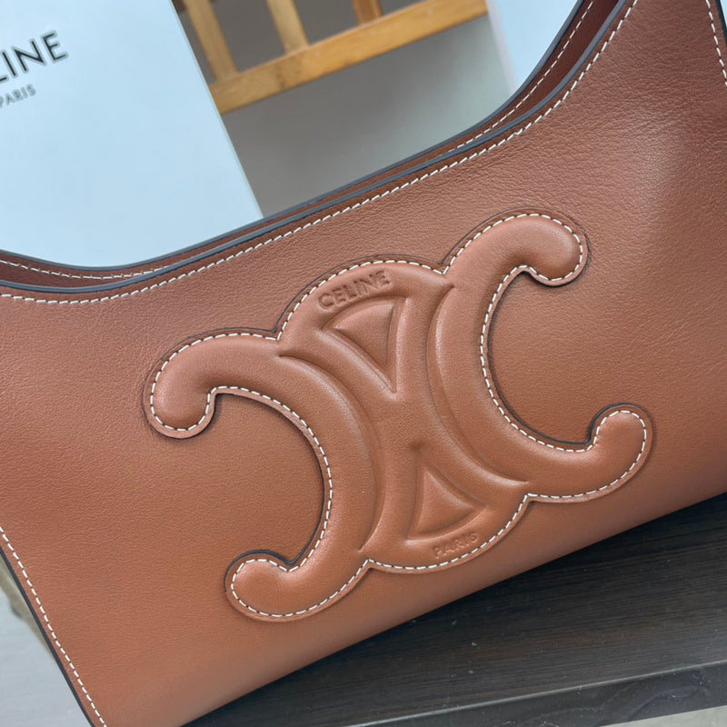Styled lifestyle shot of sleek refined women's handbag – women's luxury handbag