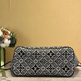 Styled lifestyle shot of polished statement women's handbag – women's luxury handbag