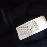 Flat lay presentation of Lacoste luxury clothing with monogram-inspired silhouette