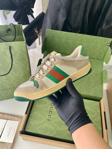 Gucci Casual sneakers in classic monochrome retro runner design front view