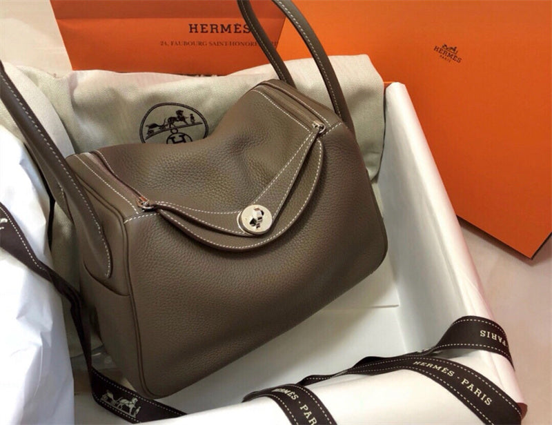  Elegant top-handle bag carried on shoulder 10