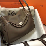  Elegant top-handle bag carried on shoulder 10
