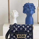 Side profile of chic statement women's handbag – women's luxury accessory