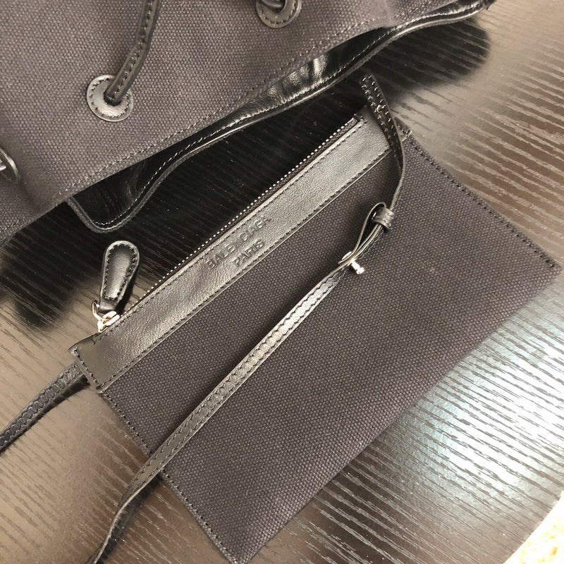 Side profile of polished everyday-luxe women's handbag – women's statement bag