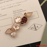 Close-up detail view of Van Cleef & Arpels unisex jewelry piece