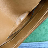 Side profile of signature premium women's handbag – women's luxury accessory