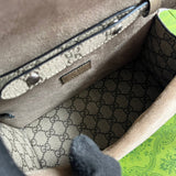 Side profile of chic polished women's handbag – women's designer-style accessory