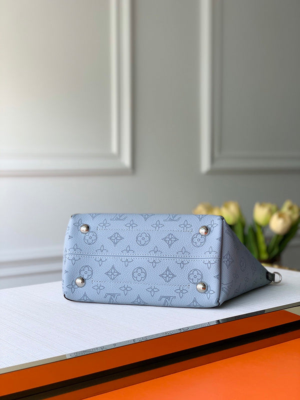 Top view of statement elevated women's handbag – women's designer-style accessory