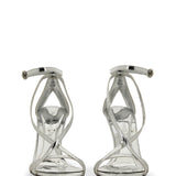 Close-up of Alexander McQueen sandals hardware and fine stitching