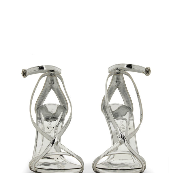 Close-up of Alexander McQueen sandals hardware and fine stitching