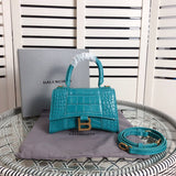 Close-up detail of structured polished women's handbag – women's luxury accessory