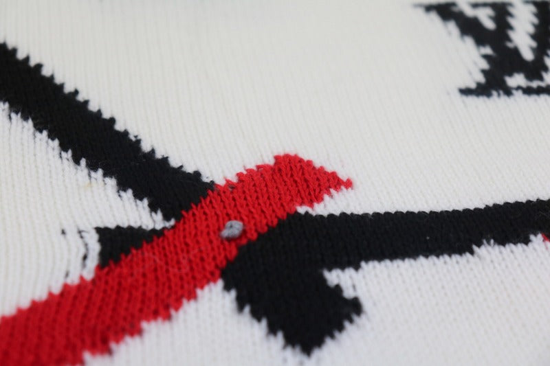 Front view of Louis Vuitton luxury clothing with logo-detail design
