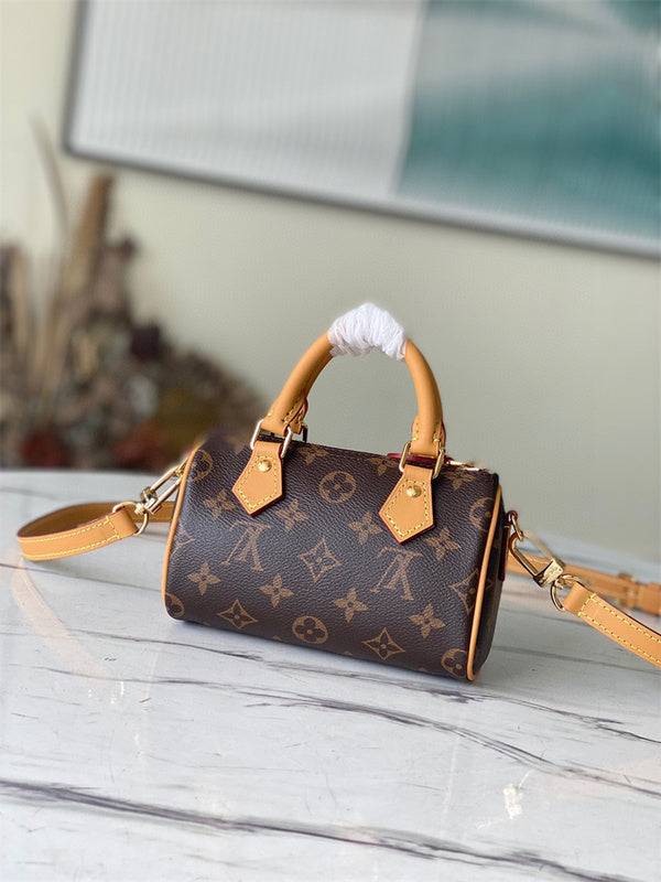  Elegant top-handle bag carried on shoulder