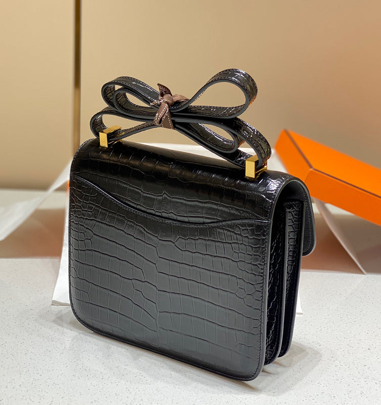Side view of polished structured handbag
