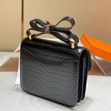 Side view of polished structured handbag