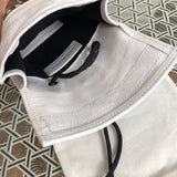 Side profile of polished statement women's handbag – women's designer-style accessory