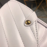 Handle and strap detail of sleek chic women's handbag – women's luxury accessory
