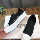 Alexander McQueen Nude Low-Top Sneakers - Close-Up Texture View