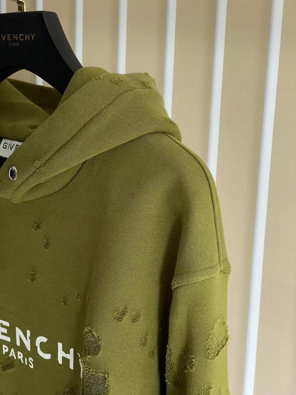 Flat lay presentation of Givenchy luxury clothing with logo-detail design