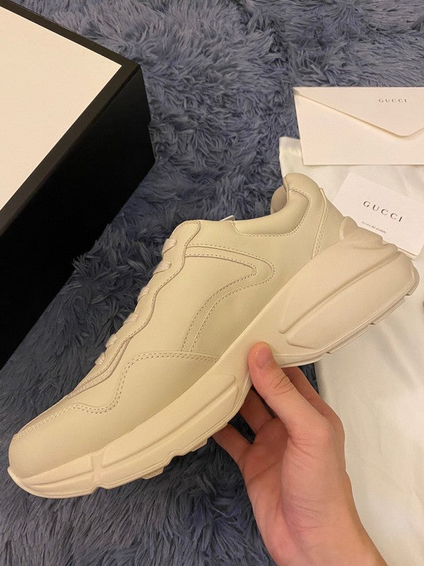 Gucci soft grey luxury sneakers view 4 bold athletic profile