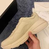 Gucci soft grey luxury sneakers view 4 bold athletic profile