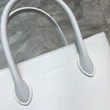 Statement Vegan Leather Handbag - Refined Silhouette | Women's Statement Accessory #915 - styled full view (image 7) of designer-inspired handbag