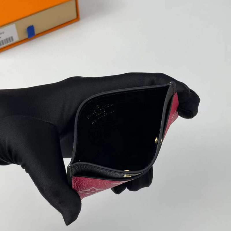 Front view of classic structured women's handbag – women's luxury accessory