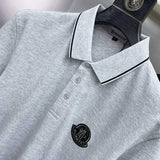 Full styled look of Moncler luxury clothing with logo-detail design