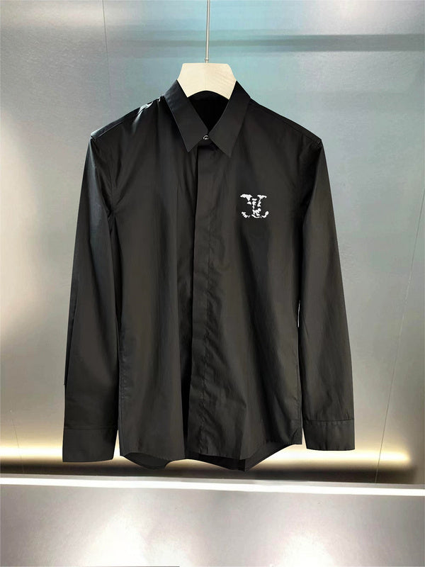 Flat lay presentation of Louis Vuitton luxury clothing with tailored silhouette