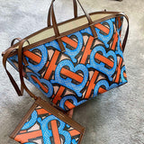 Ziva's Charm handbag – side angle view (one versatile size)