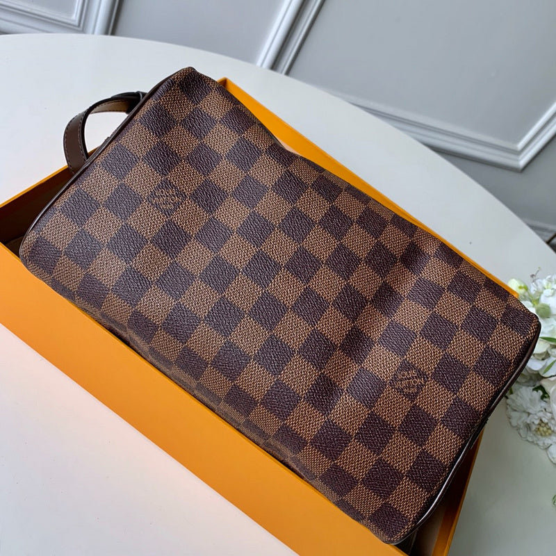 Close-up detail of polished signature women's handbag – women's luxury handbag