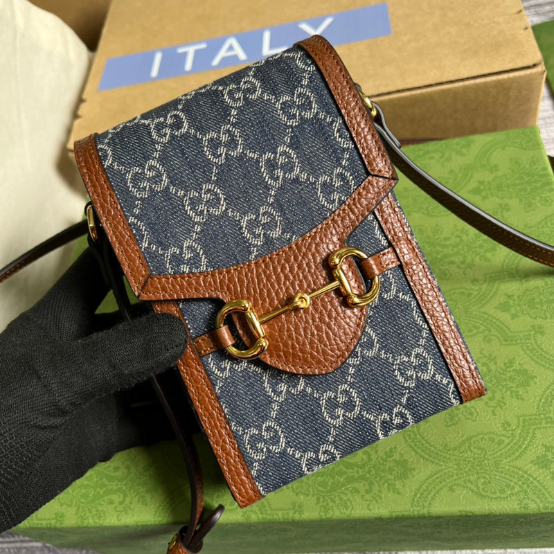 Handle and strap detail of modern elevated women's handbag – women's statement bag